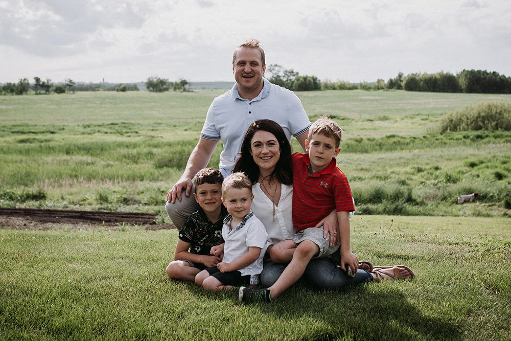Vince Badinski with his family on the farm