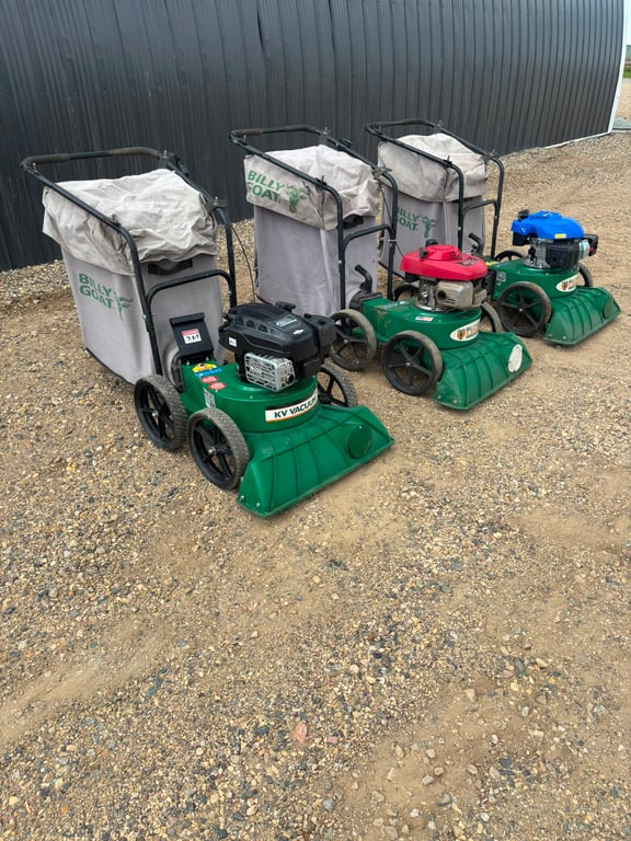 Three walk-behind leaf and debris vacuums
