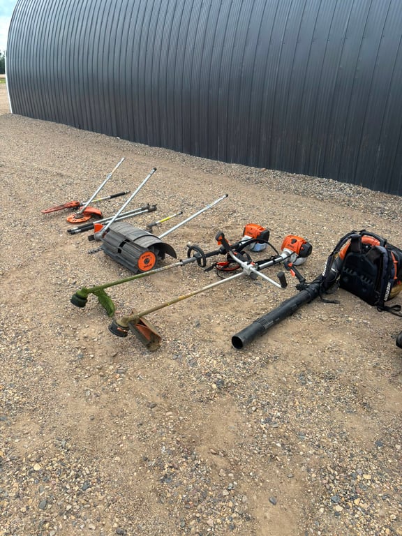 Trimmers, edgers and a backpack blower