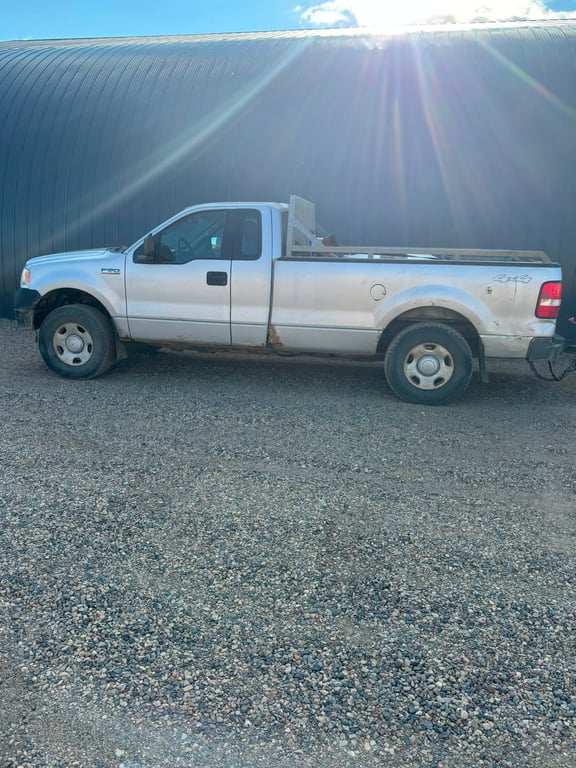 Silver regular cab pickup truck