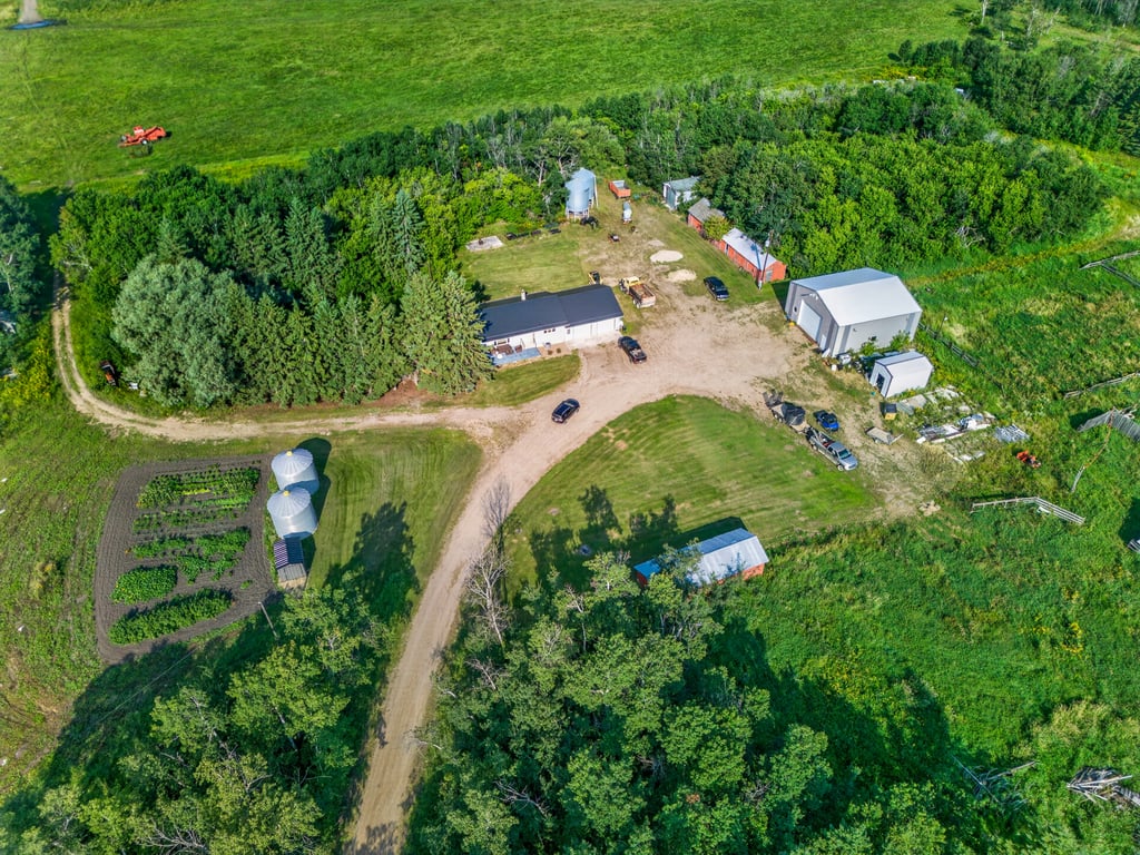 Aerial view of the Lefebvre yard site with the house, shop and bins