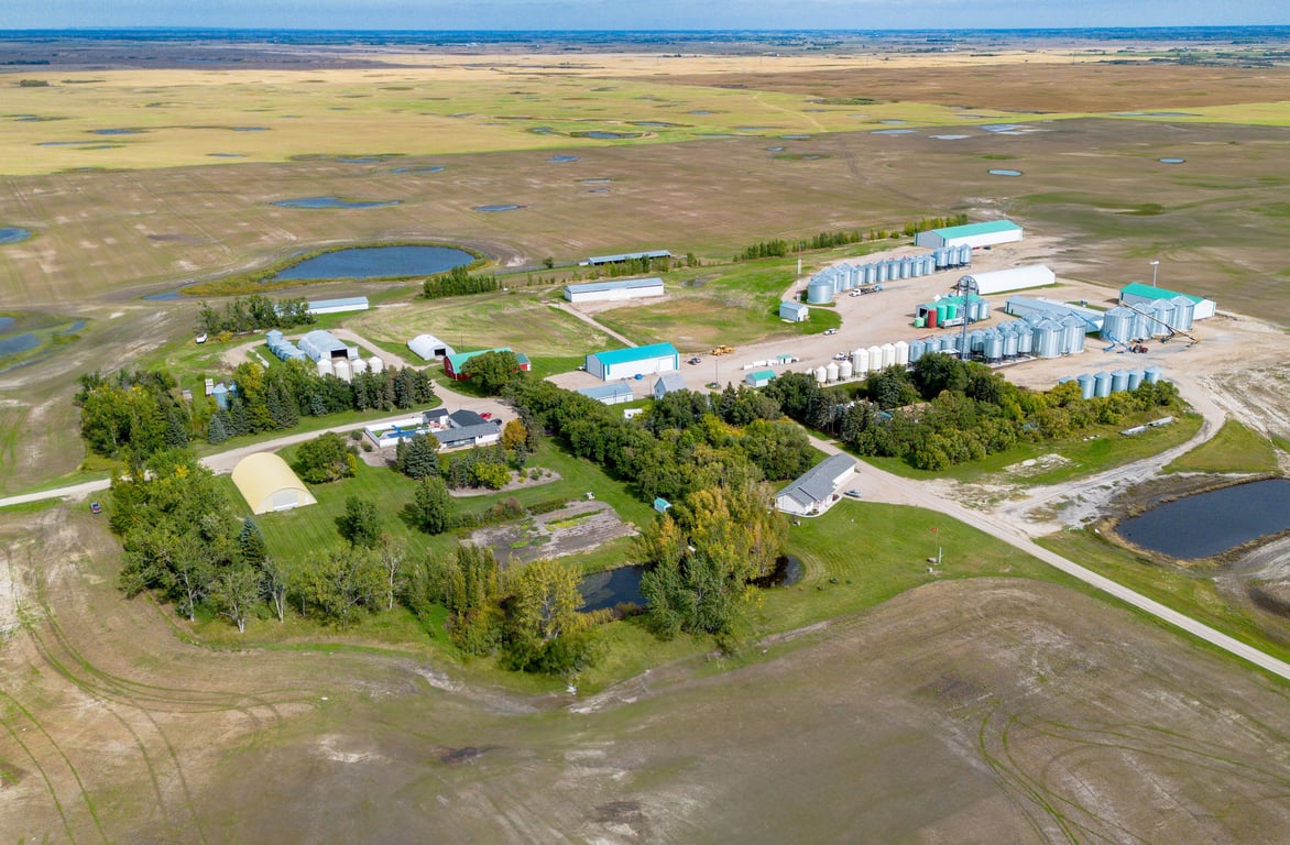 Aerial view of the Lumsden farm yard with the pool and residences